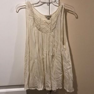 Cream colored flows tank